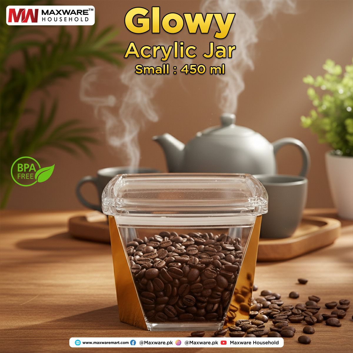 Maxware Glowy 450ml small clear acrylic food storage jar with gold trim filled with coffee beans on a wooden table.